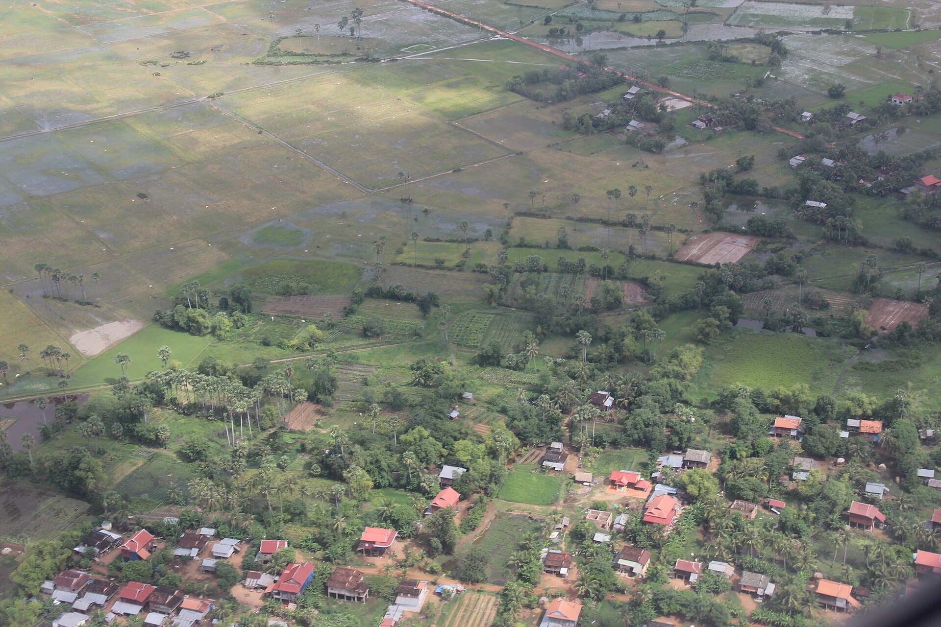 Aerial view of fields and villages from a flight into Siem Reap in the rainy season