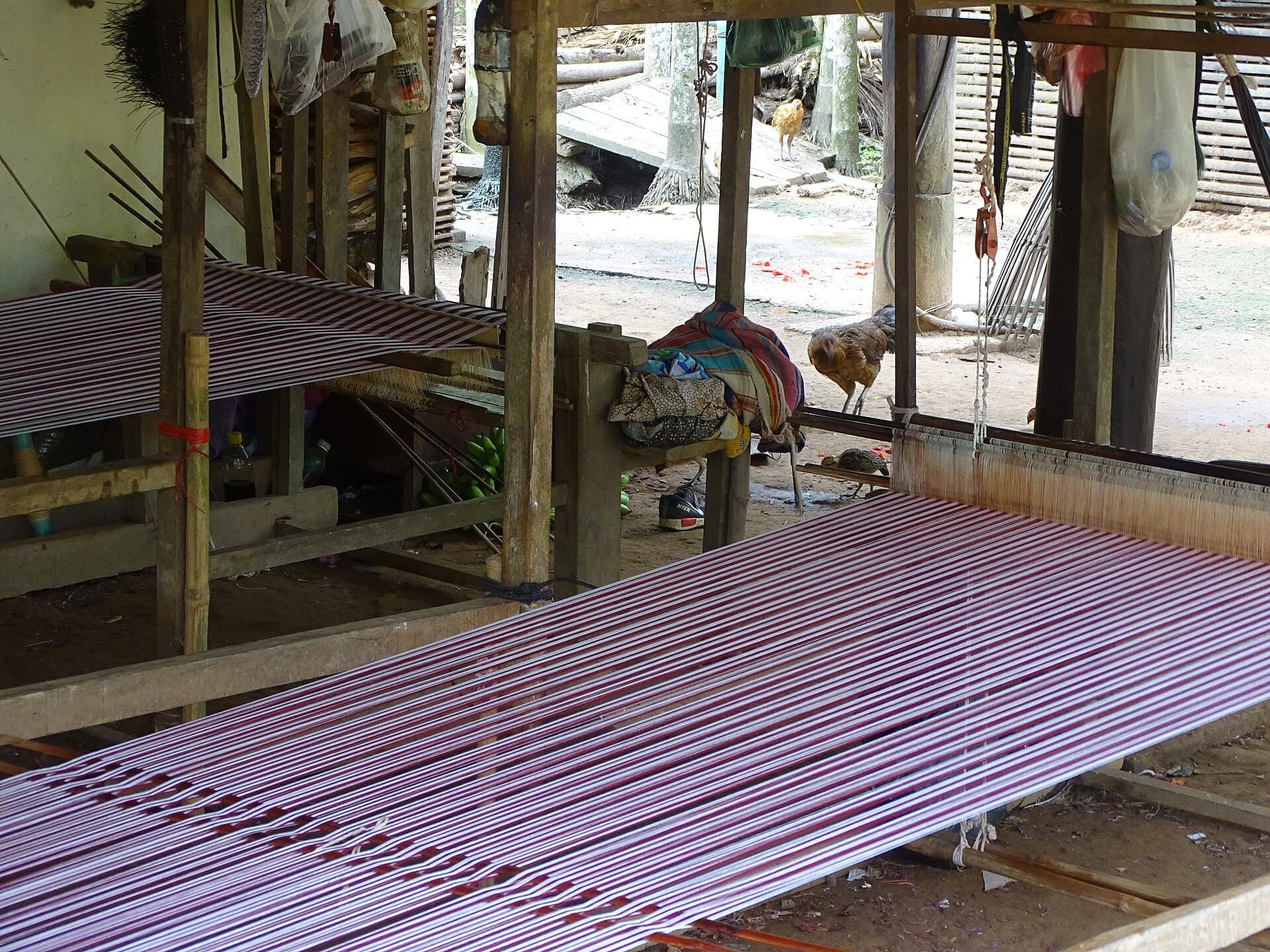 Silk looms strung with threads at Prey Chung Kran, near Kampong Cham